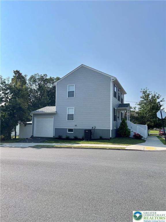 1066 Devonshire Road Allentown, PA 18103 - Photo 20 of 20 a front view of a house with a yard and garage