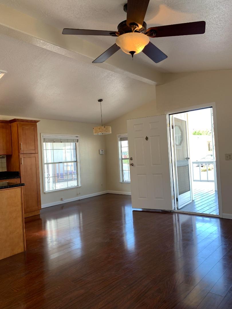 1201 Sycamore Terrace, Unit 87 Sunnyvale, CA 94086 - Photo 16 of 26 a view of an empty room with window and wooden floor