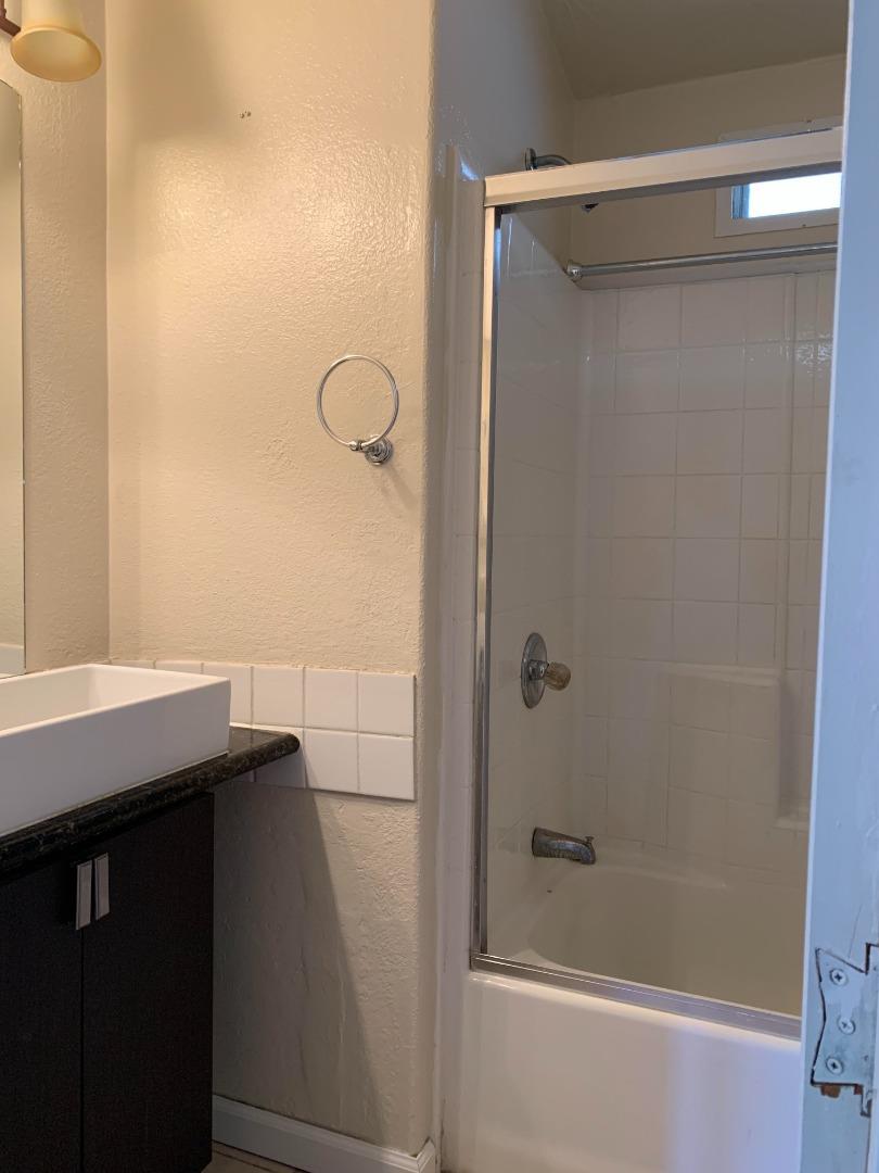 1201 Sycamore Terrace, Unit 87 Sunnyvale, CA 94086 - Photo 19 of 26 a bathroom with a shower and sink
