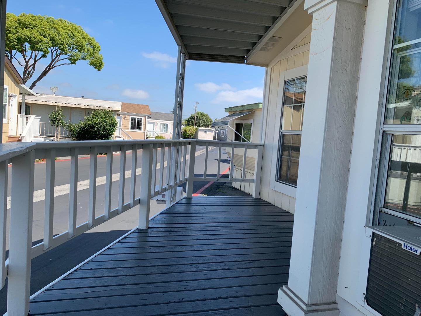 1201 Sycamore Terrace, Unit 87 Sunnyvale, CA 94086 - Photo 3 of 26 a view of a balcony with wooden floor