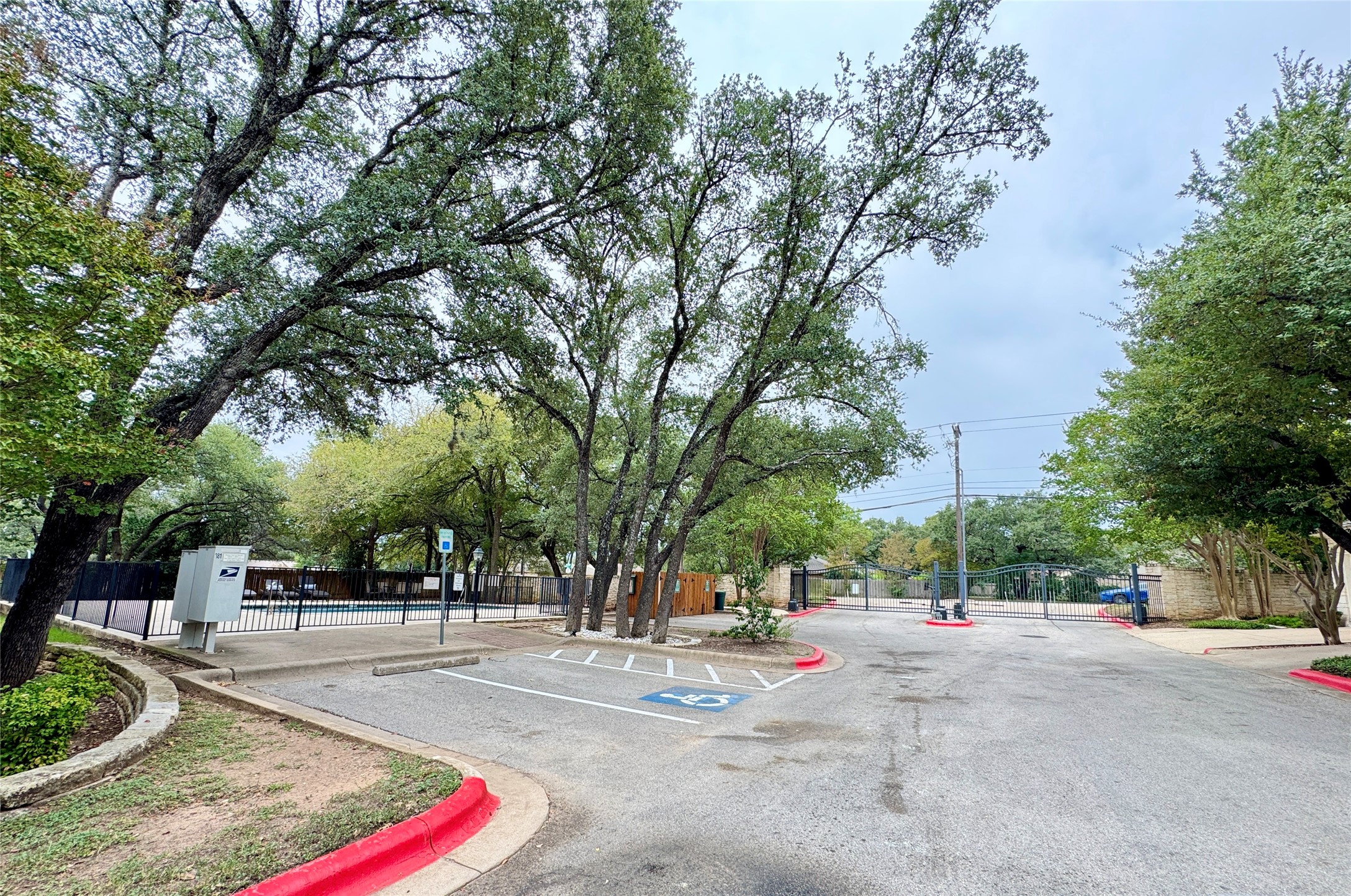 4508 Duval Road, Unit 6602 Austin, TX 78727 - Photo 22 of 23 a building with trees in front of it