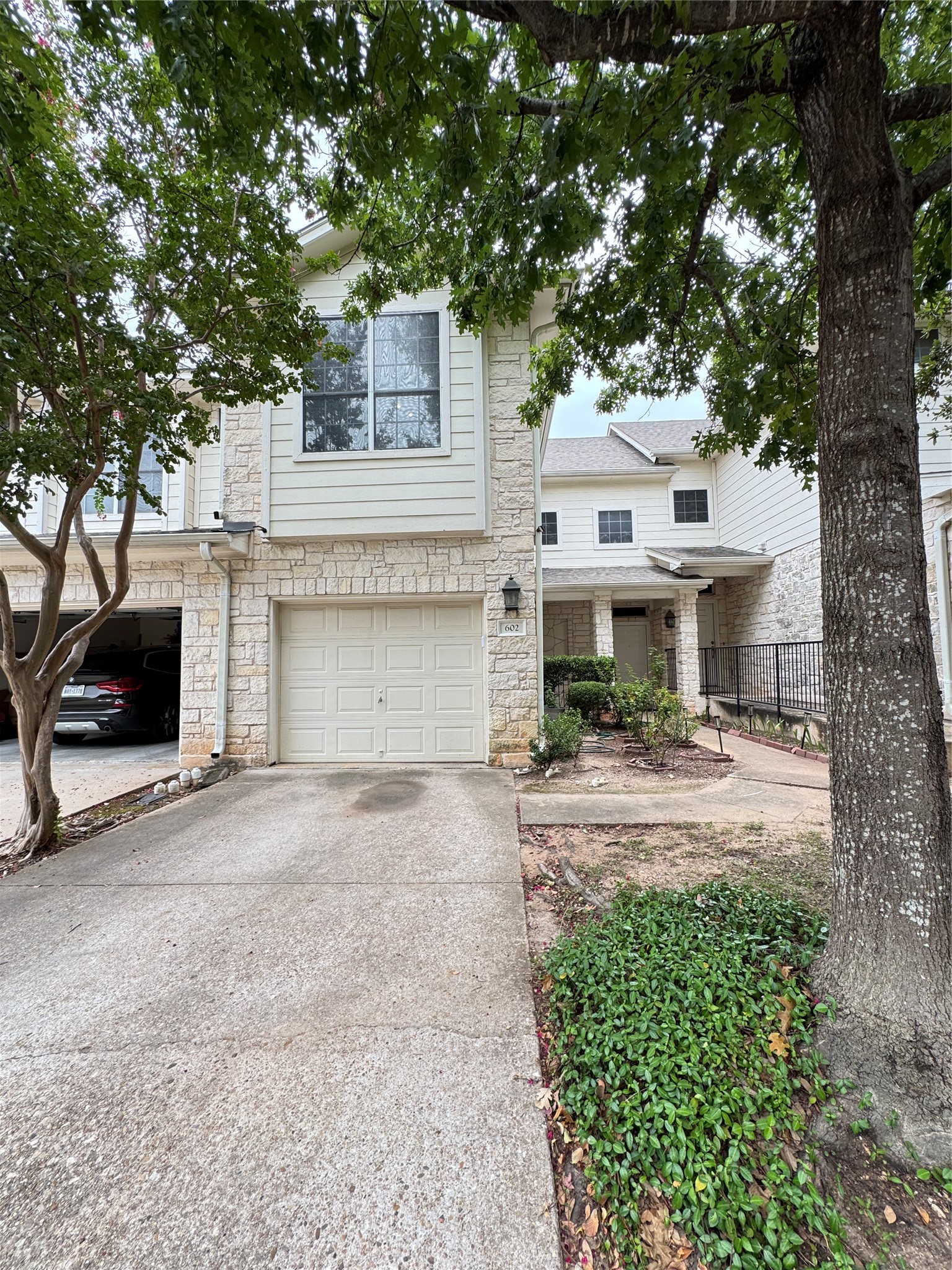 4508 Duval Road, Unit 6602 Austin, TX 78727 - Photo 3 of 23 front view of a house with a yard