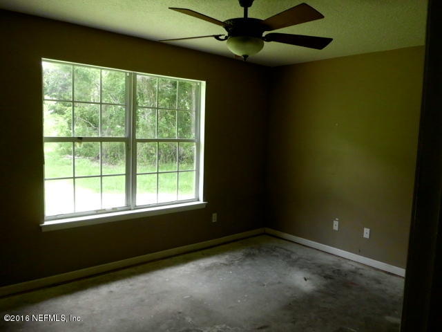 1800 Bennett Road St. Augustine, FL 32092 - Photo 19 of 24 a view of an empty room with a window