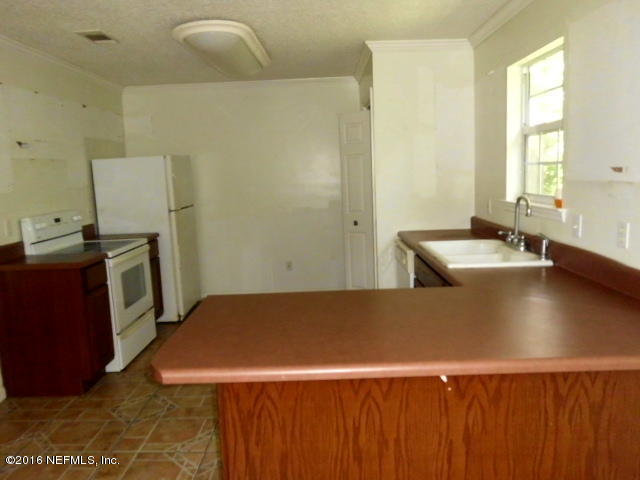 1800 Bennett Road St. Augustine, FL 32092 - Photo 5 of 24 a view of a kitchen with a sink