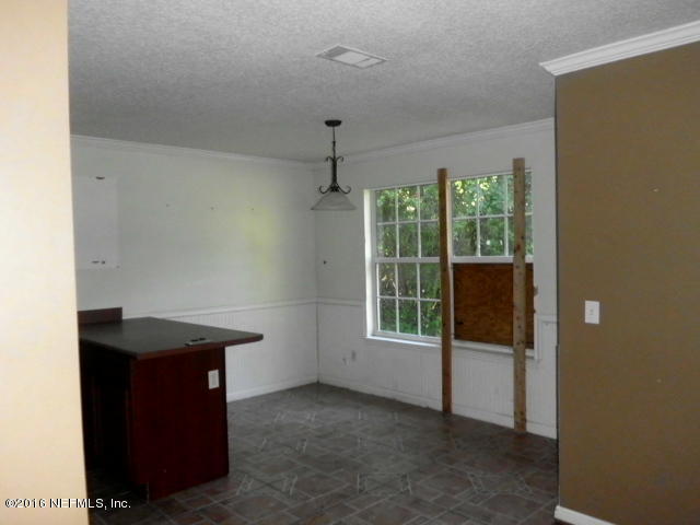 1800 Bennett Road St. Augustine, FL 32092 - Photo 9 of 24 an empty room with windows