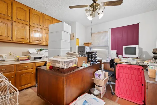a bathroom with a sink a toilet and a shower
