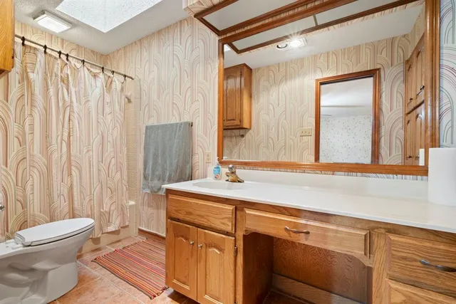 an aerial view of a house with a garden