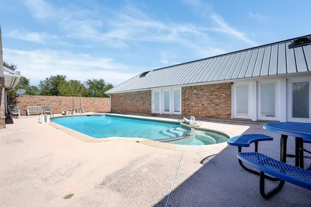 an outdoor space with seating area
