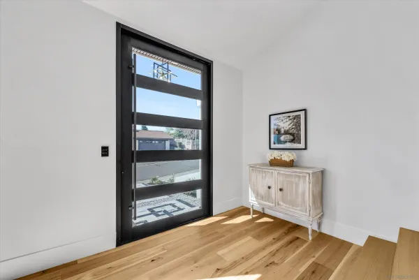 a view of an empty room and window