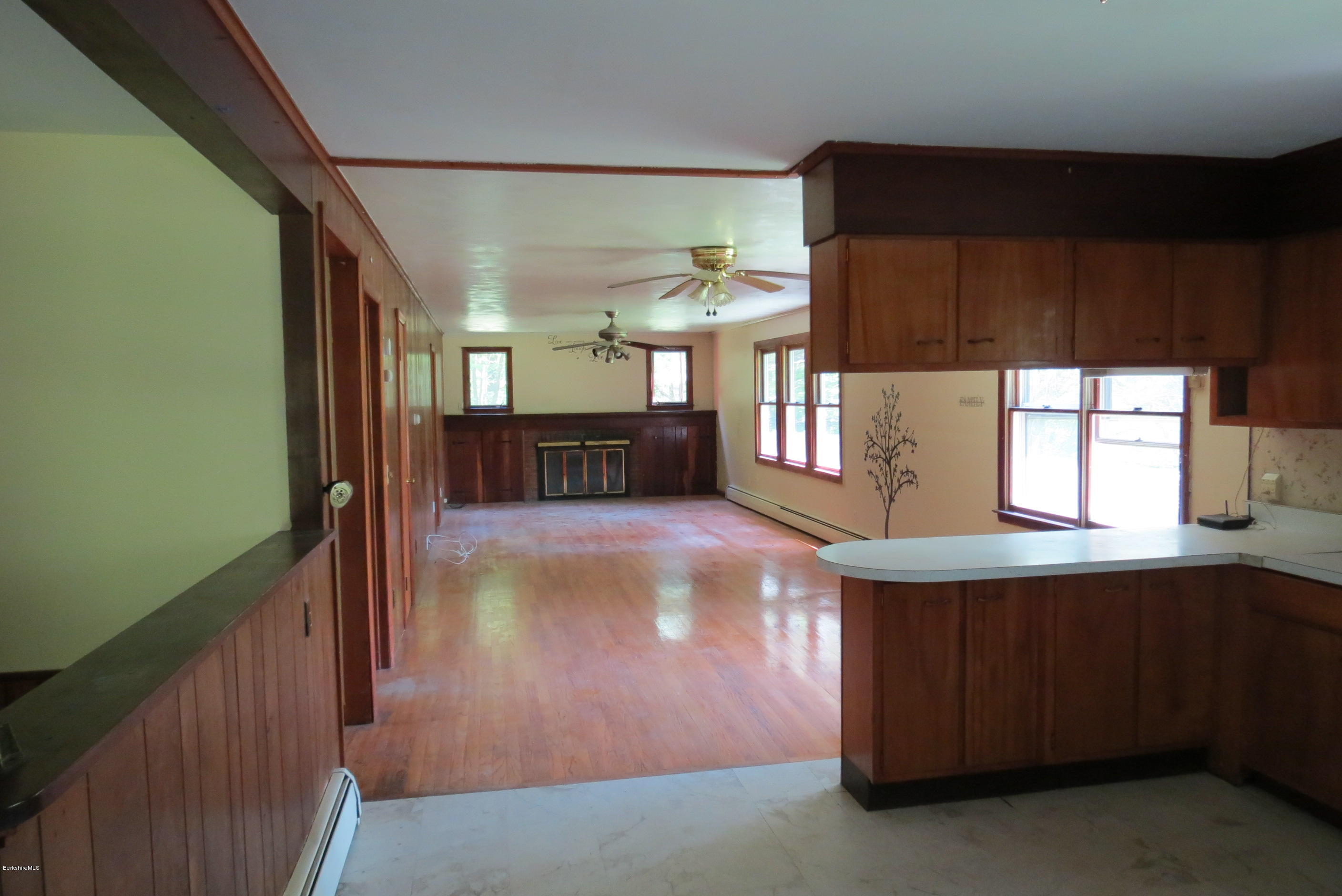 186 Collins Road Stamford, VT 05352 - Photo 22 of 54 Kitchen into dining/living