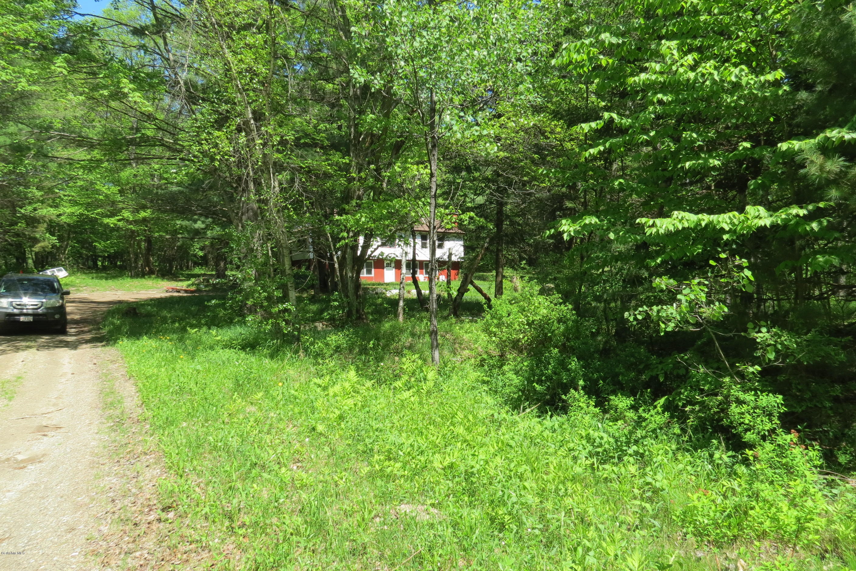 186 Collins Road Stamford, VT 05352 - Photo 4 of 54 Nestled in woods about 200' from road
