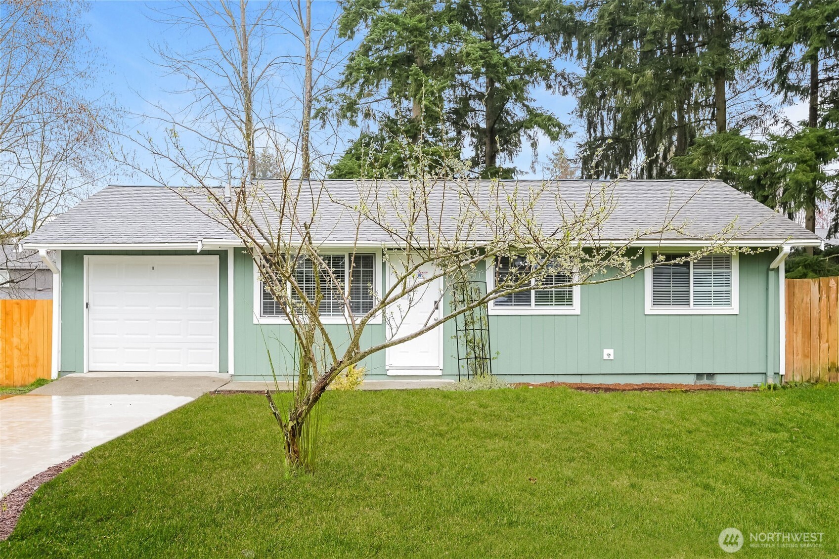 2611 Southwest 333rd Place Federal Way, WA 98023 - Photo 1 of 16 a view of a house with a backyard