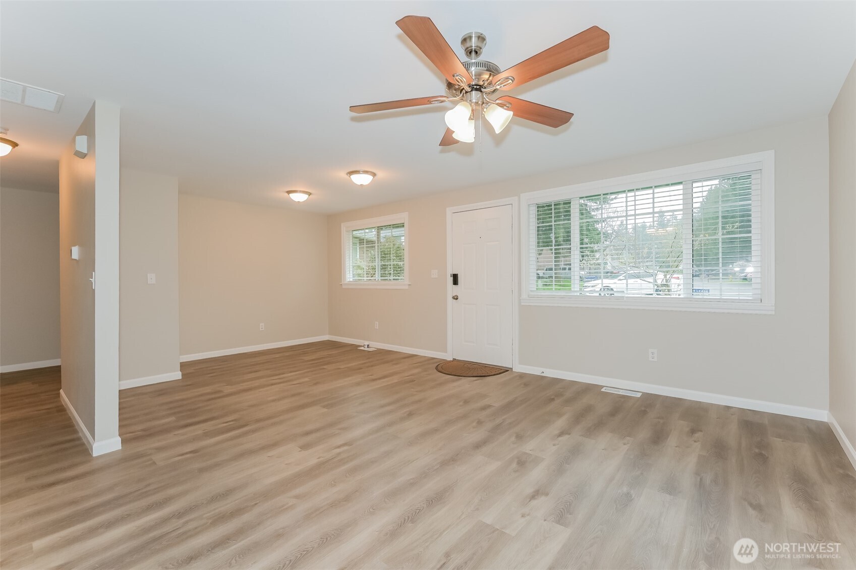 2611 Southwest 333rd Place Federal Way, WA 98023 - Photo 4 of 16 wooden floor in an empty room with a window