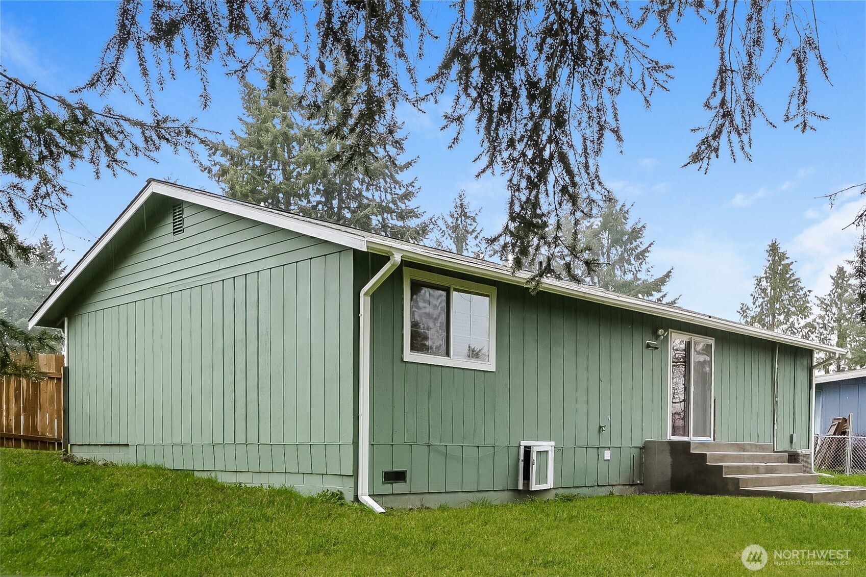 2611 Southwest 333rd Place Federal Way, WA 98023 - Photo 5 of 16 a backyard of a house with lots of green space