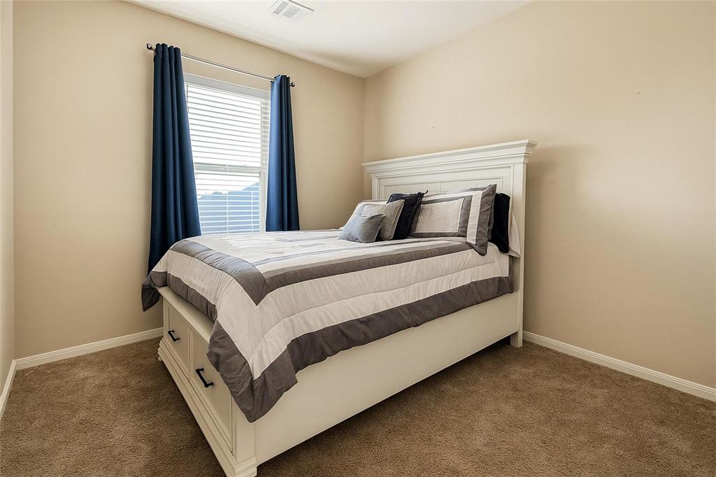 1837 Rialto Lane Crowley, TX 76036 - Photo 9 of 24 Bedroom featuring neutral wall paint, carpet flooring, a window with horizontal blinds, and a ceiling vent
