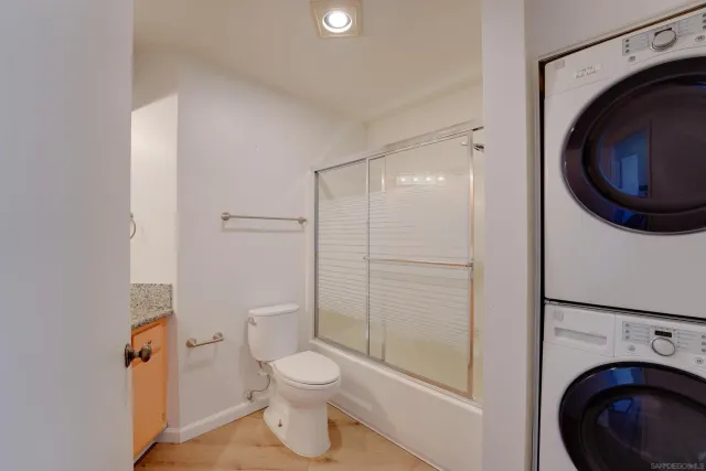 a bathroom with a toilet and a sink