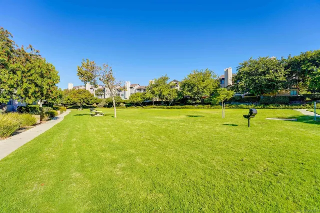 a view of a swimming pool and an outdoor space