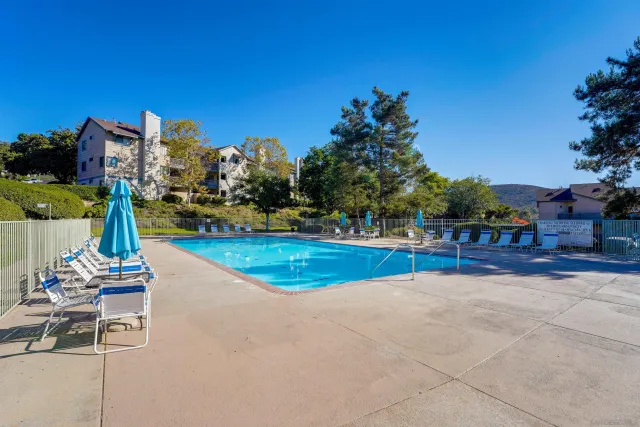 a view of a house with swimming pool
