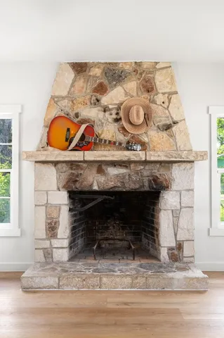 a fireplace with a wooden floor