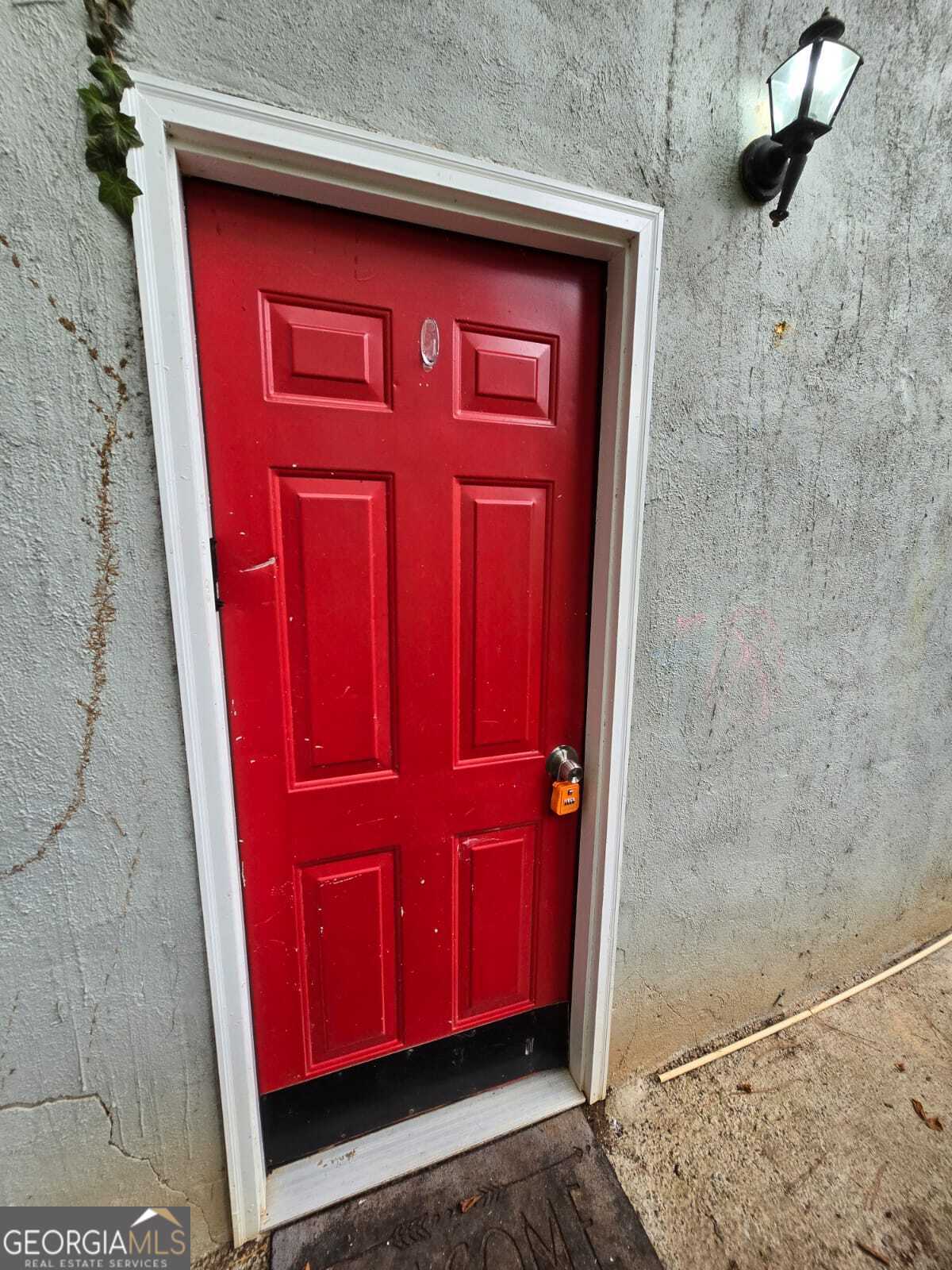 2963 Redwine Road, Unit REAR East Point, GA 30344 - Photo 1 of 9 a view of a red door