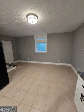 en empty room with windows