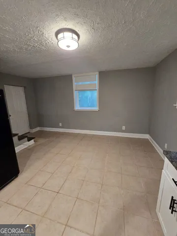 en empty room with windows