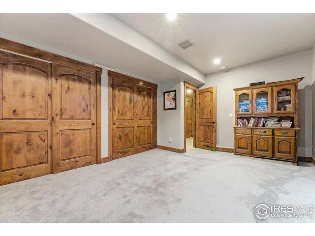 a view of a livingroom with wooden floor
