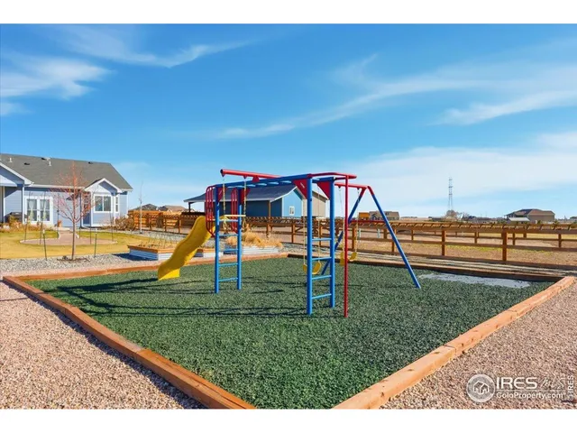 a front view of a house with trees