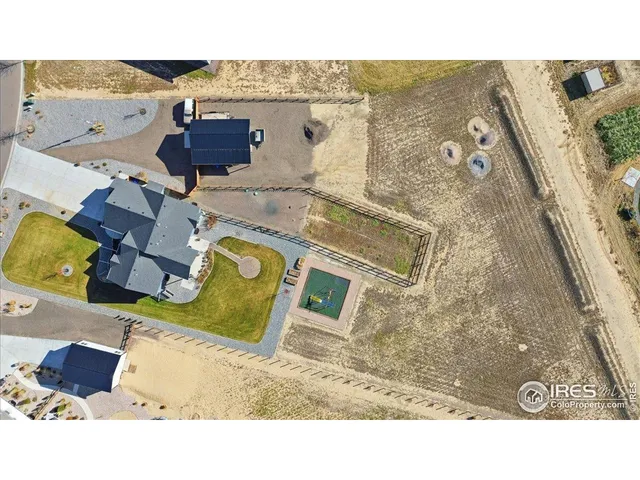 a view of a swimming pool with a lounge chairs