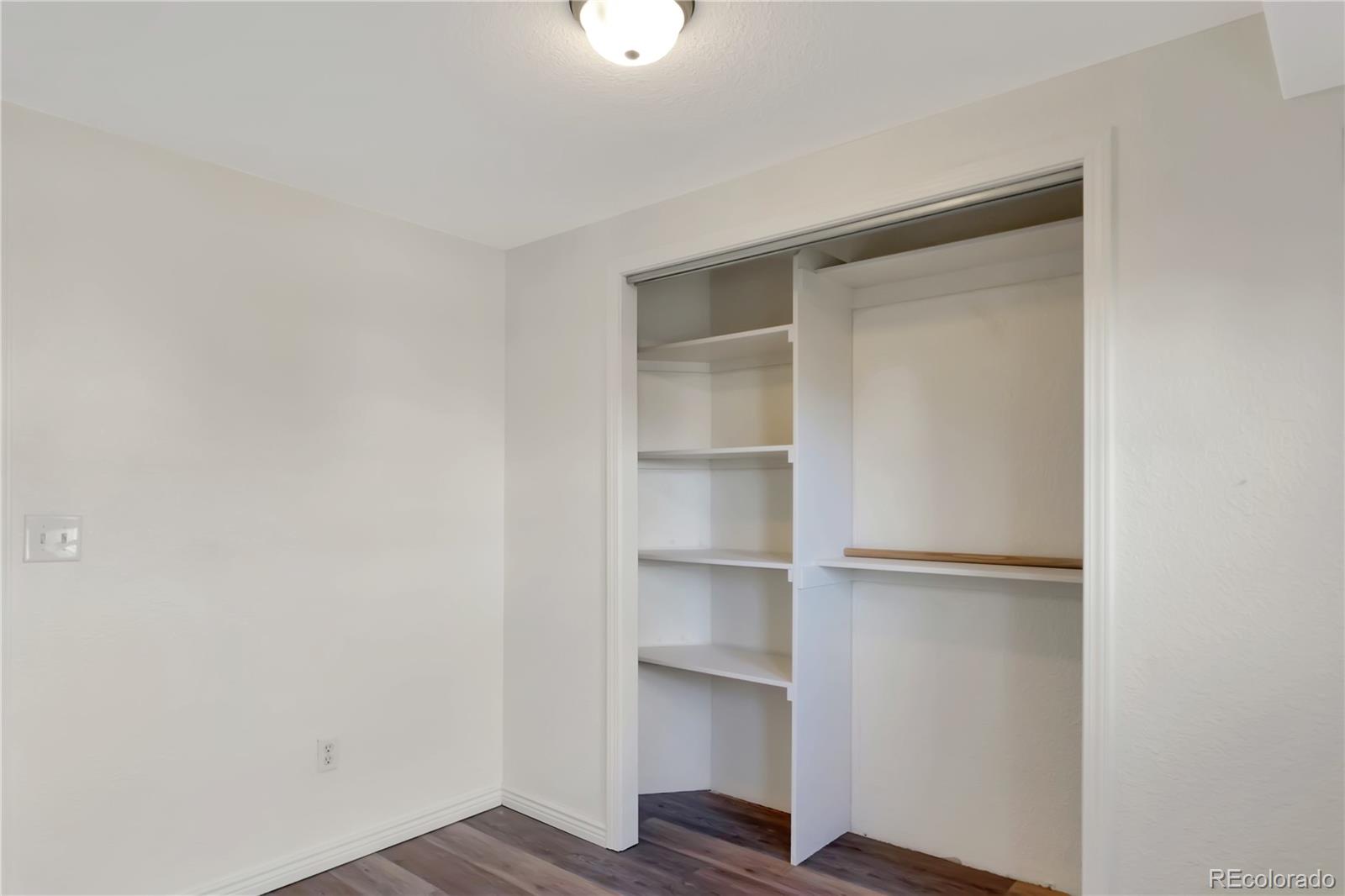 8533 Cook Court Denver, CO 80229 - Photo 11 of 15 a view of an empty walk in closet