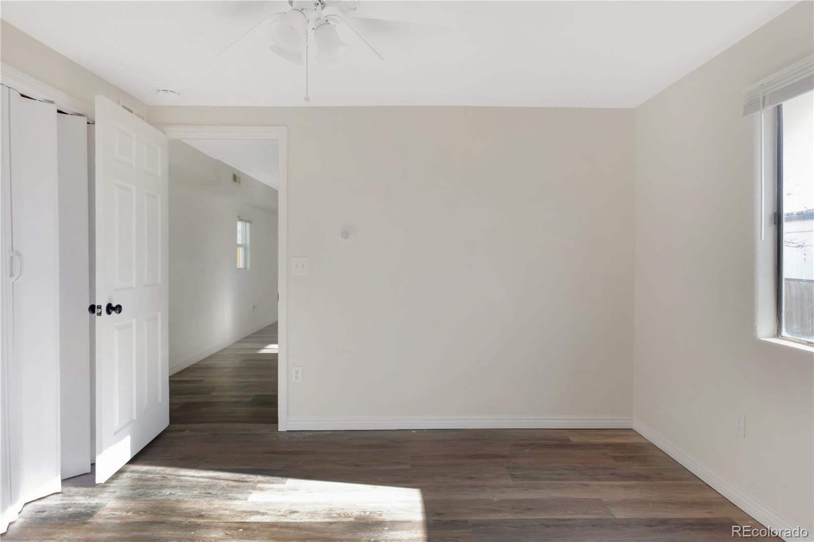 8533 Cook Court Denver, CO 80229 - Photo 13 of 15 wooden floor in an empty room