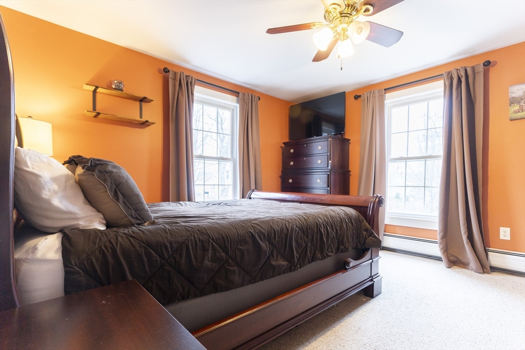 68 D Street Athol, MA 01331 - Photo 18 of 35 a bed sitting in a bedroom next to a window