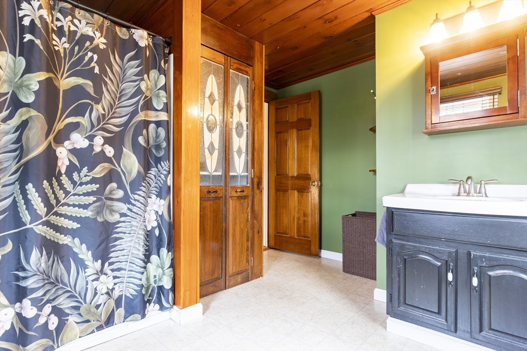 68 D Street Athol, MA 01331 - Photo 23 of 35 a bathroom with a sink and a mirror