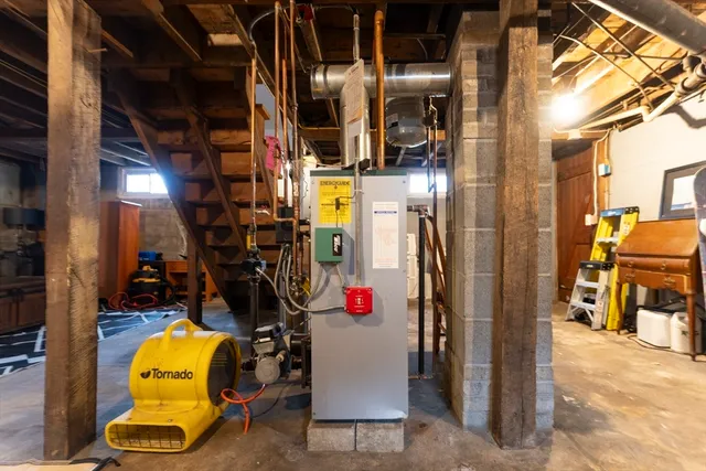 a view of a house with a barbeque