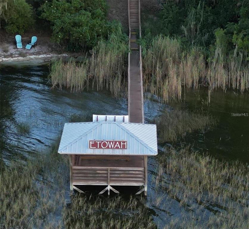 Undisclosed Address Tavares, FL 32778 - Photo 25 of 29 a view of a park with a bench