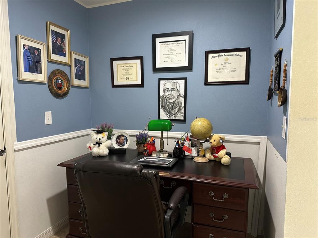 Undisclosed Address Tavares, FL 32778 - Photo 9 of 29 a bathroom with a sink and a mirror