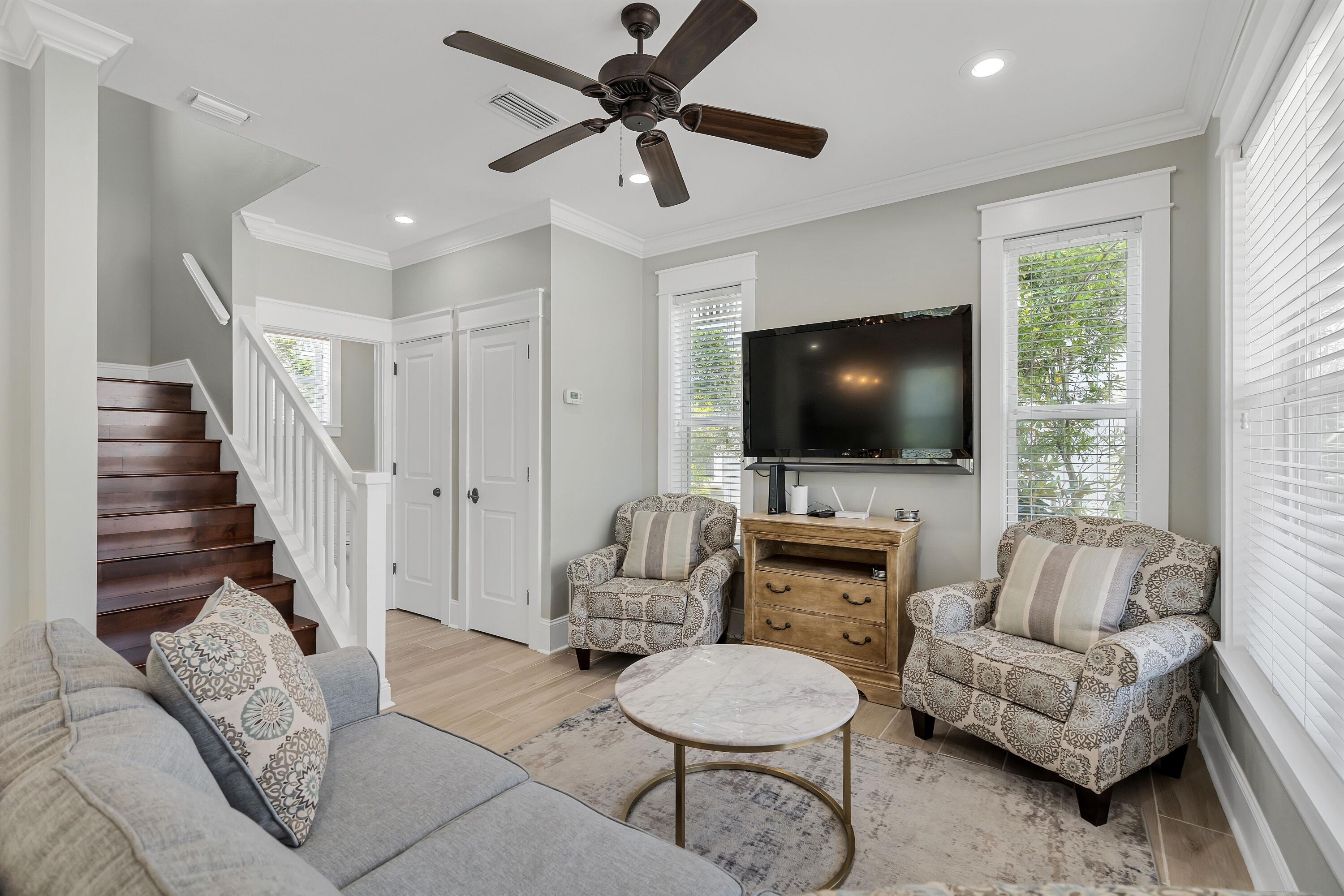 45 Abbey Road Santa Rosa Beach, FL 32459 - Photo 12 of 34 a living room with furniture and a flat screen tv