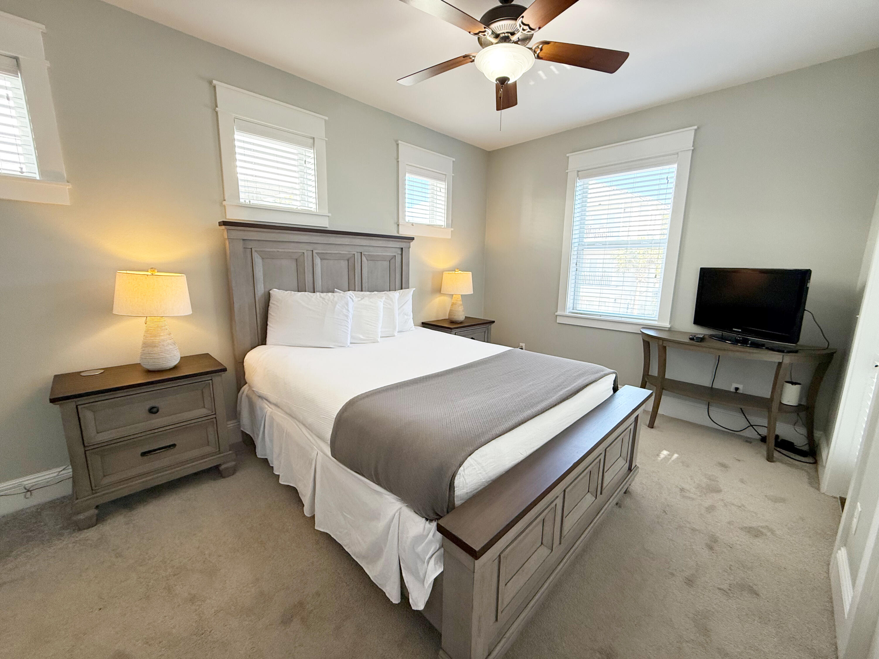 45 Abbey Road Santa Rosa Beach, FL 32459 - Photo 19 of 34 a bedroom with a bed and a flat screen tv