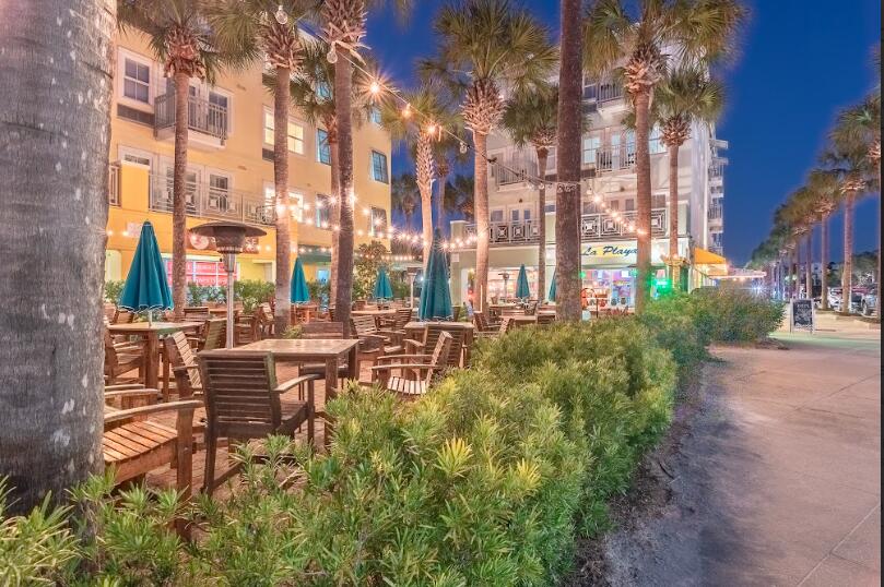 45 Abbey Road Santa Rosa Beach, FL 32459 - Photo 31 of 34 a view of a building with garden and sitting area