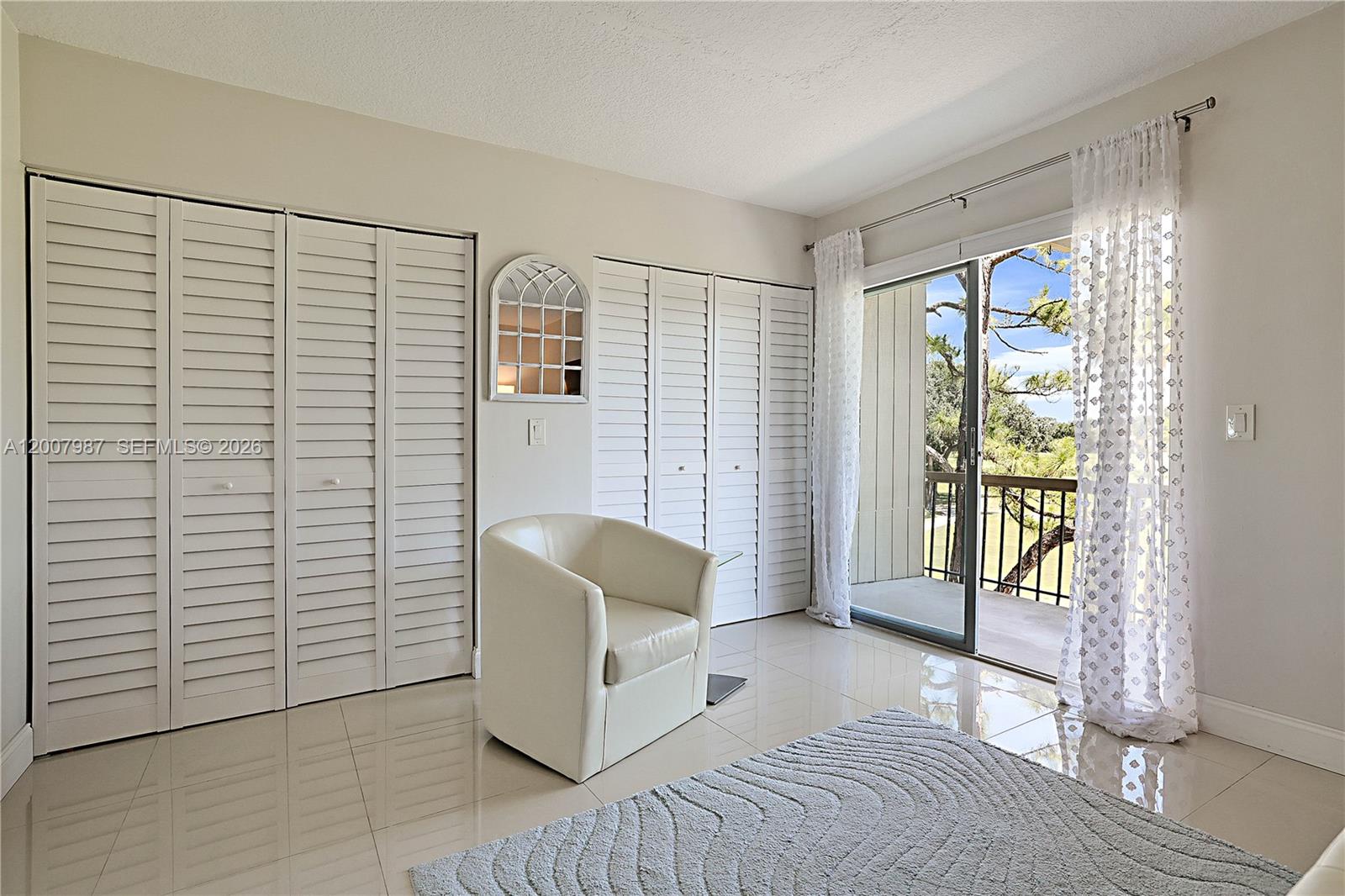 9169 Southeast Riverfront Terrace, Unit M Jupiter, FL 33469 - Photo 19 of 37 Nice sitting area in your Bedroom