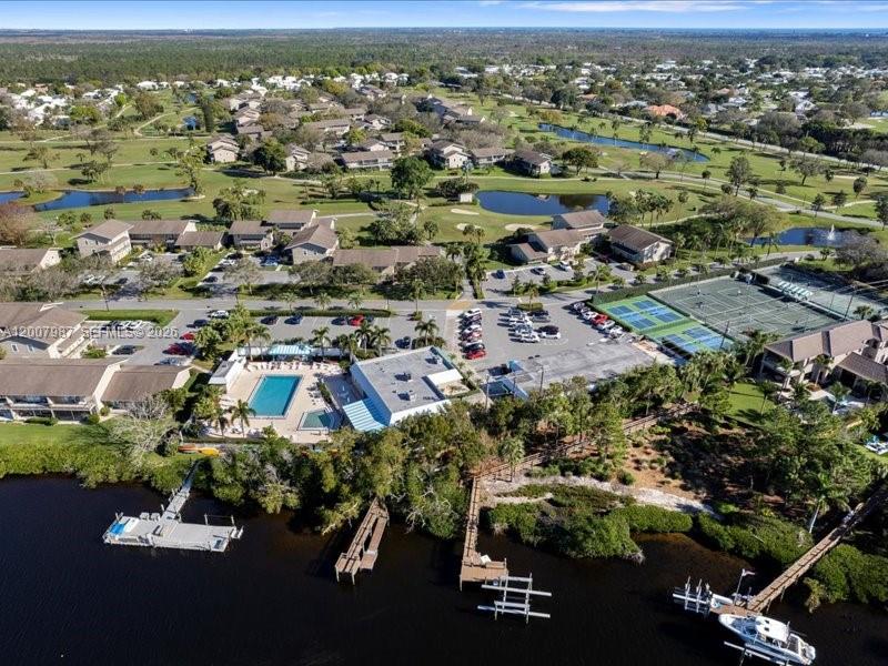 9169 Southeast Riverfront Terrace, Unit M Jupiter, FL 33469 - Photo 2 of 37 Riverbend CC Community close to beaches, Boating Shops.