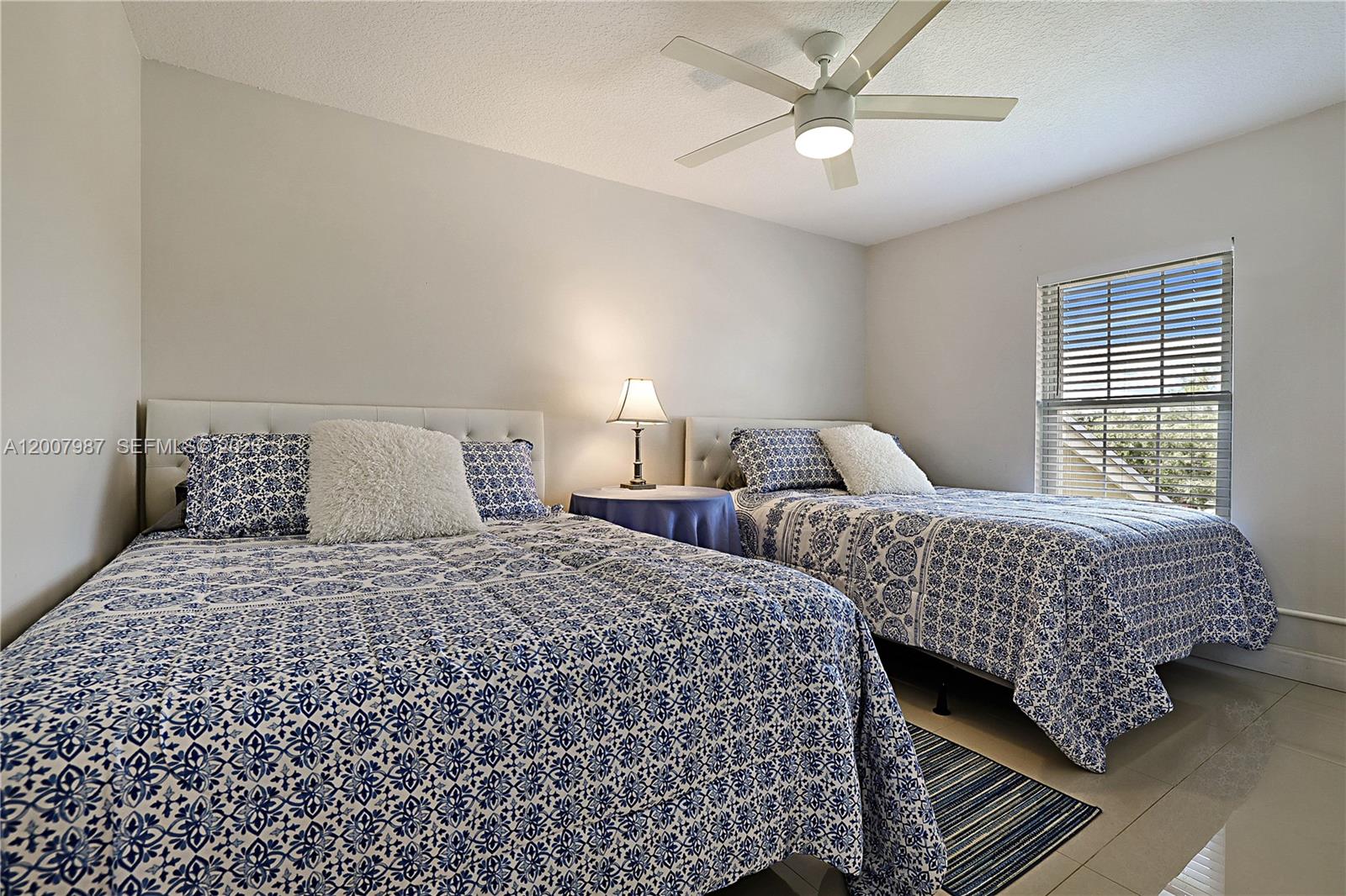 9169 Southeast Riverfront Terrace, Unit M Jupiter, FL 33469 - Photo 23 of 37 2 Queen size beds, huge walk in closet with built in