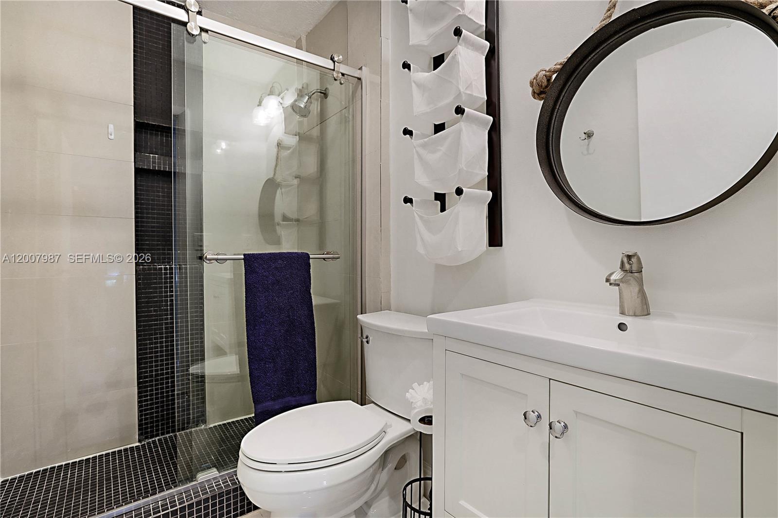 9169 Southeast Riverfront Terrace, Unit M Jupiter, FL 33469 - Photo 24 of 37 Redone Quest Bathroom large walk in shower