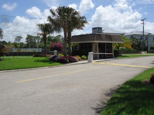 9169 Southeast Riverfront Terrace, Unit M Jupiter, FL 33469 - Photo 28 of 37 24 hr. manned guard gate