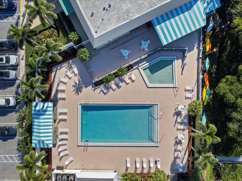 9169 Southeast Riverfront Terrace, Unit M Jupiter, FL 33469 - Photo 33 of 37 Large heated pools along the river