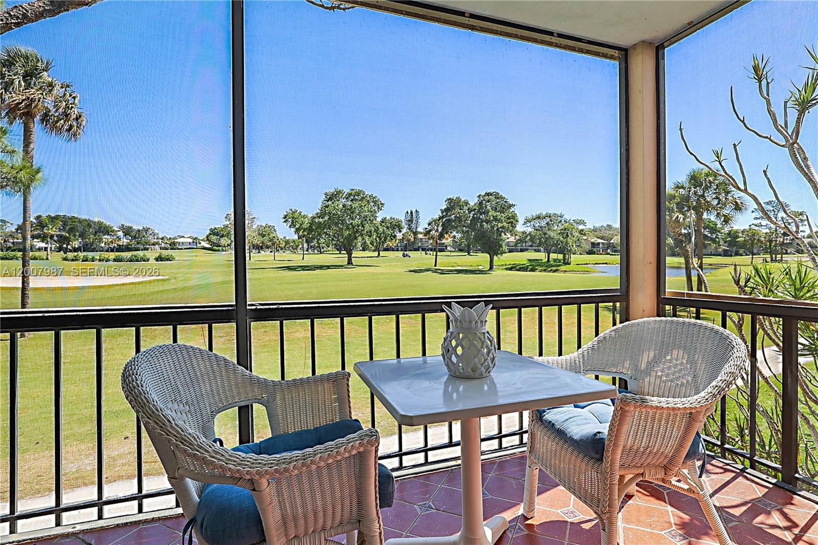 9169 Southeast Riverfront Terrace, Unit M Jupiter, FL 33469 - Photo 5 of 37 Screened balconey eastern exposure of the golf course and lakes.
