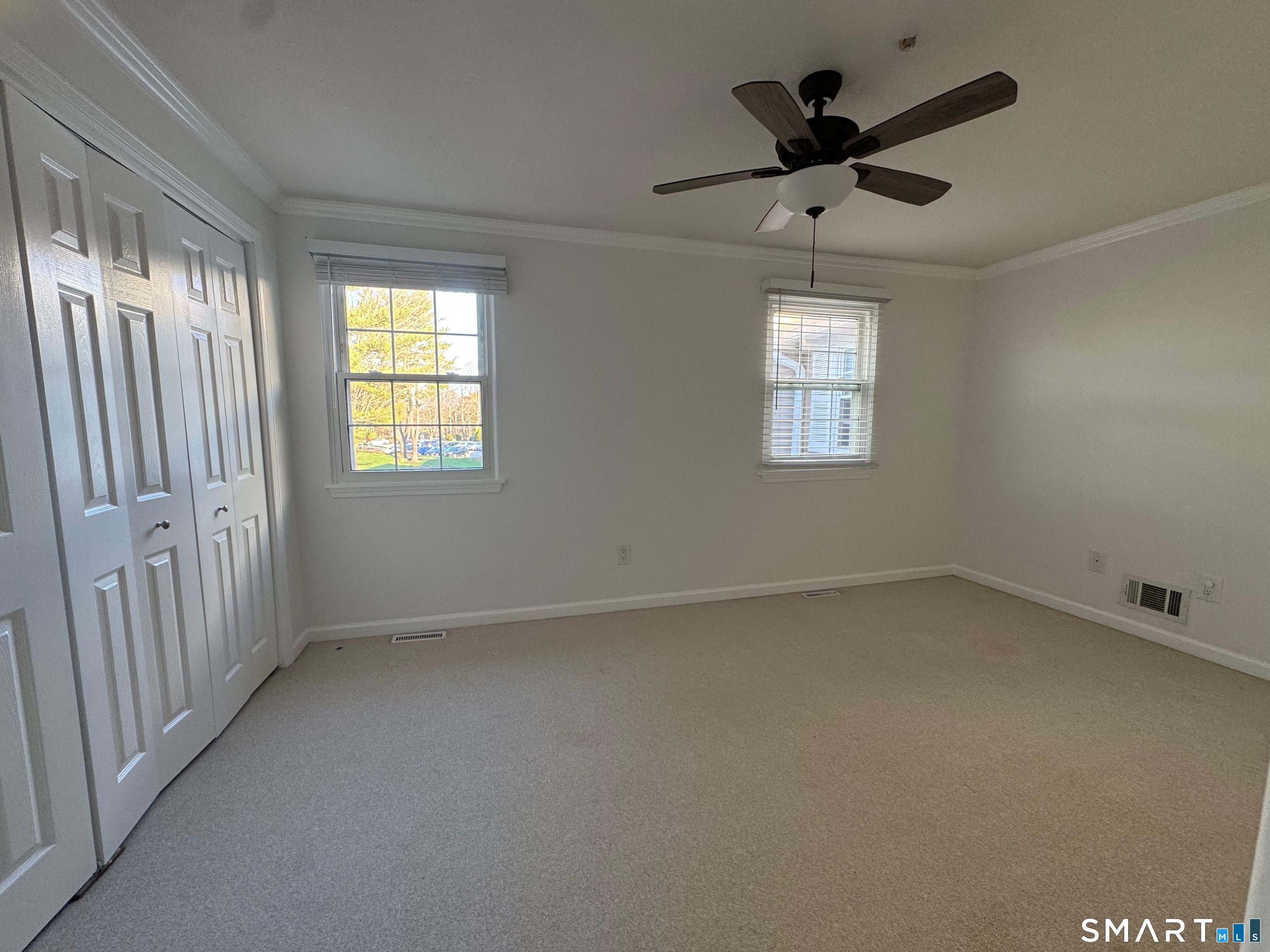 88 East Gate Lane, Unit 88 Hamden, CT 06514 - Photo 33 of 62 a view of an empty room with a window