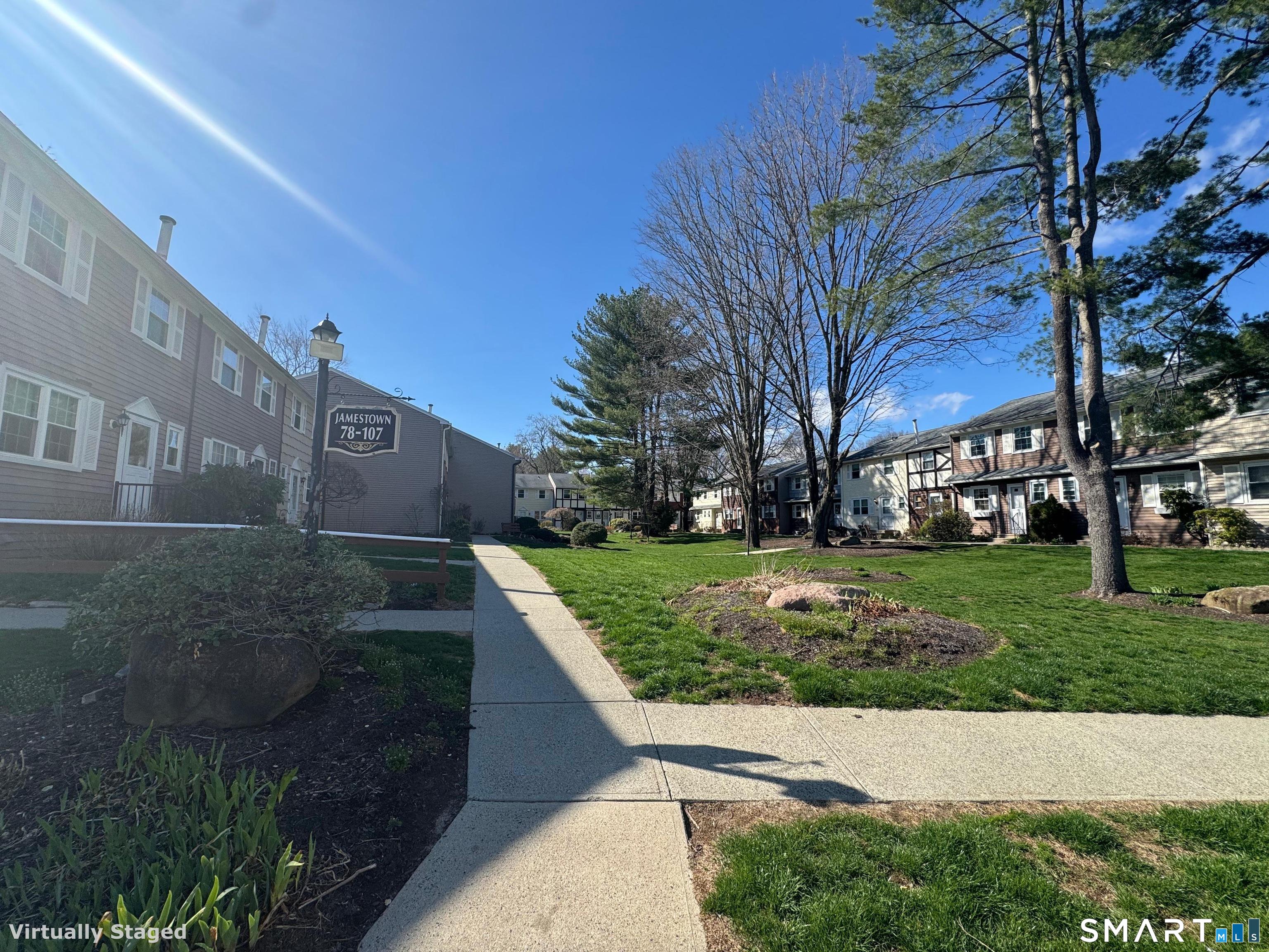 88 East Gate Lane, Unit 88 Hamden, CT 06514 - Photo 61 of 62 a view of a building with a yard