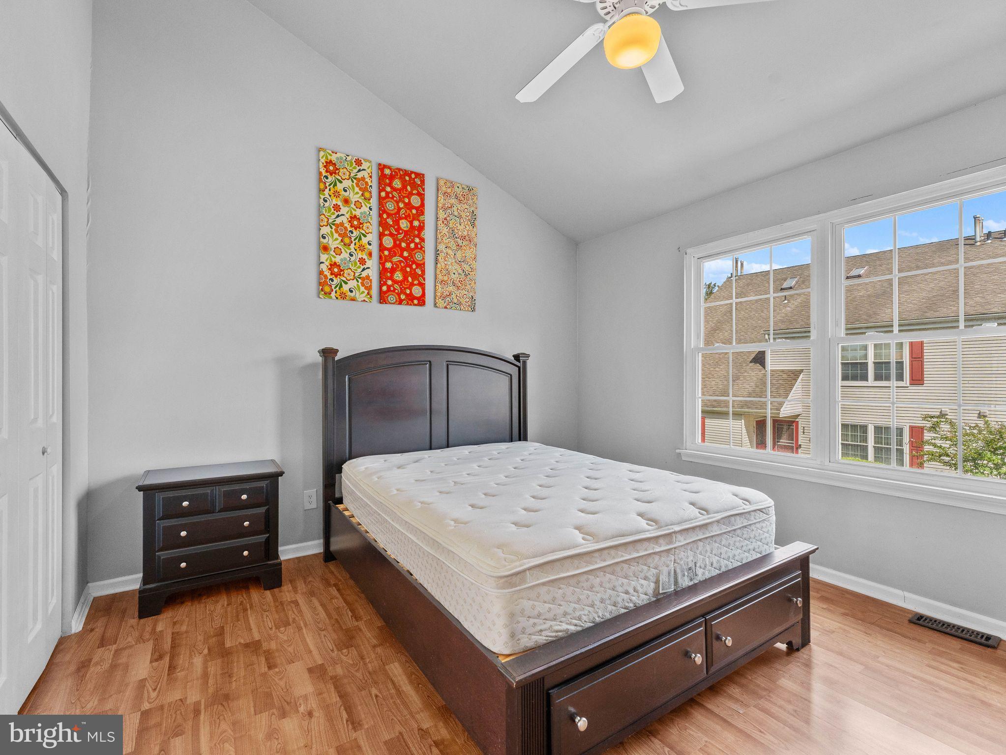 439 Glassboro Road Woodbury Heights, NJ 08097 - Photo 14 of 22 a bedroom with a bed and a window