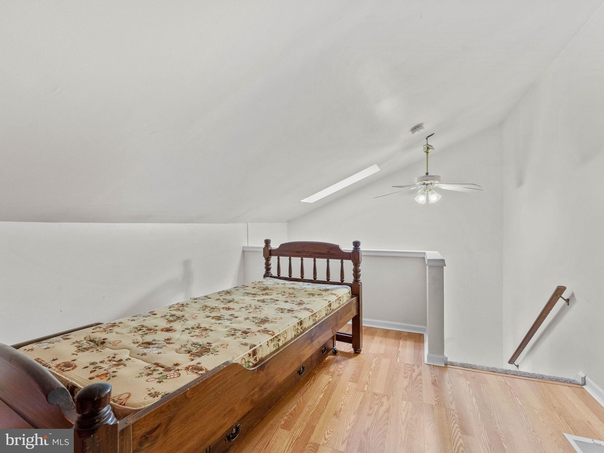 439 Glassboro Road Woodbury Heights, NJ 08097 - Photo 19 of 22 a bedroom with a bed and a dresser
